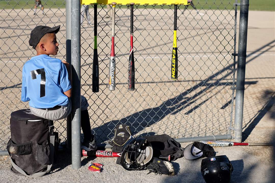 Webpbg-baseball07Nick-You-9-of-the-Light-Blue-team-waits-his-turn-at-bat