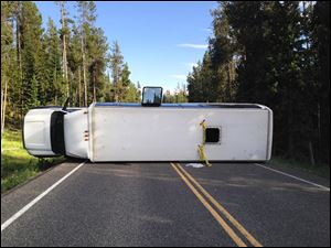 Officials say about two dozen people were taken to a hospital after this bus flipped on its side. Authorities say no other vehicles were involved. It wasn't clear who owned the bus or whether it was on a tour.