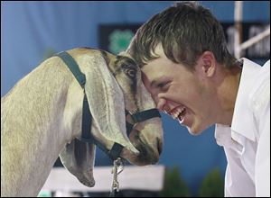 Nathan Spencer, 17, of Rudolph entered his Nubian goat, Mystro, in the pet class and obstacle competition.