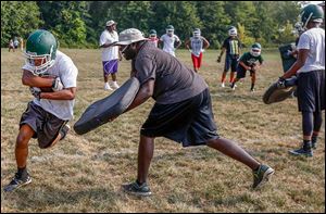 Montrell Betts runs with the football during Start’s first practice on Friday.