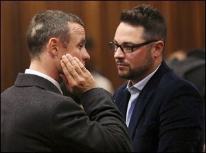 Carl Pistorius, right, has been 