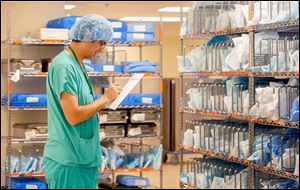 Al Jimenez, sterile processing technologist, works at ProMedica Toledo Hospital. The water crisis caused Toledo hospitals to treat an increase in patients.