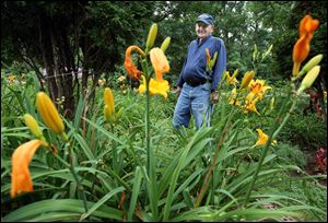 John Sabo in his garden.