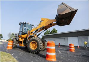 Dustin Brough of Oak Harbor, Ohio, finishes the obstacle course for the District 2 Roadeo.