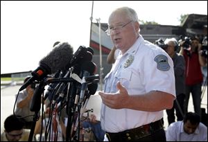 Ferguson Police Chief Thomas Jackson today released the name of the the officer accused of fatally shooting an unarmed black teenager. Chief Jackson announced that the officer's name is Darren Wilson.