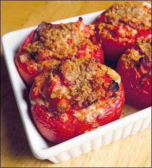 Pico de queso cheddar and bacon stuffed tomatoes.