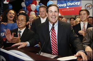 State treasurer and former CEO Doug Ducey speaks to supporters.