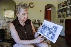 Irene Vanscoder of Bowling Green points to her Aunt Lena, pictured in a photo she has donated for the Fulton County Fair.