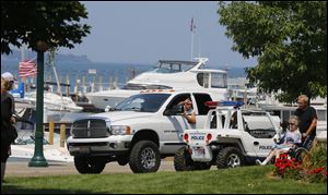 A Put-in-Bay police officer on patrol last month along Bayview Avenue.