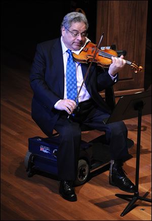 Violinist Itzhak Perlman will perform at 6 p.m. Sept. 14 in Hill Auditorium, Ann Arbor.