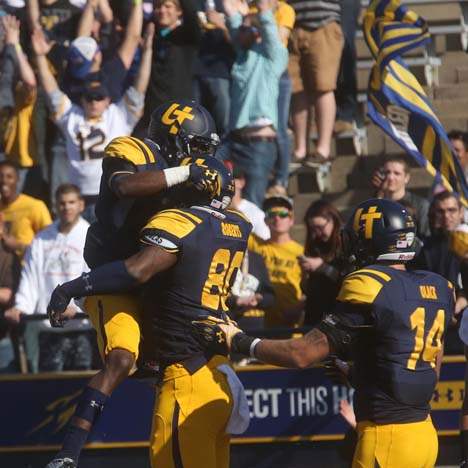 UTFB26-jones-with-roberts-td-celebrate