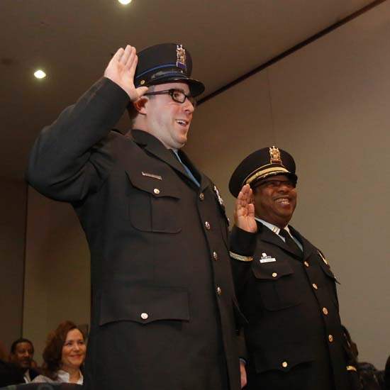 CTY-Police31-SWEARING-IN-HAND-RAISED