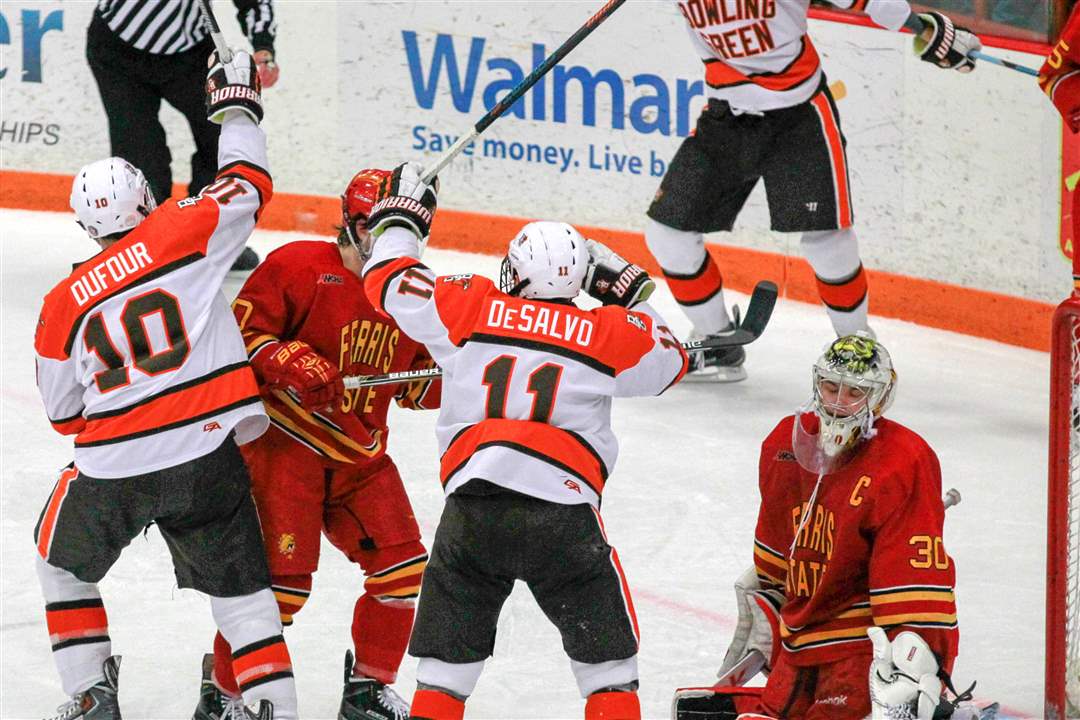 SPT-BGhockey7pBGSU-s-Kevin-Dufour-left-scores-agai