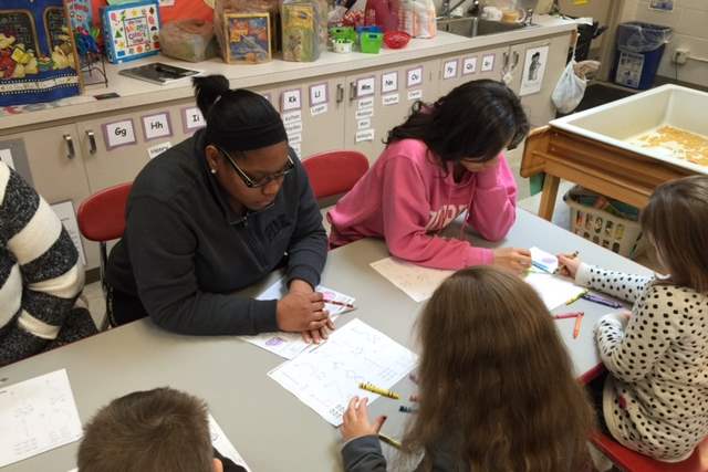 Lourdes-students-Eden-Smith-and-Joy-Franklin-working-with-the-preschoolers