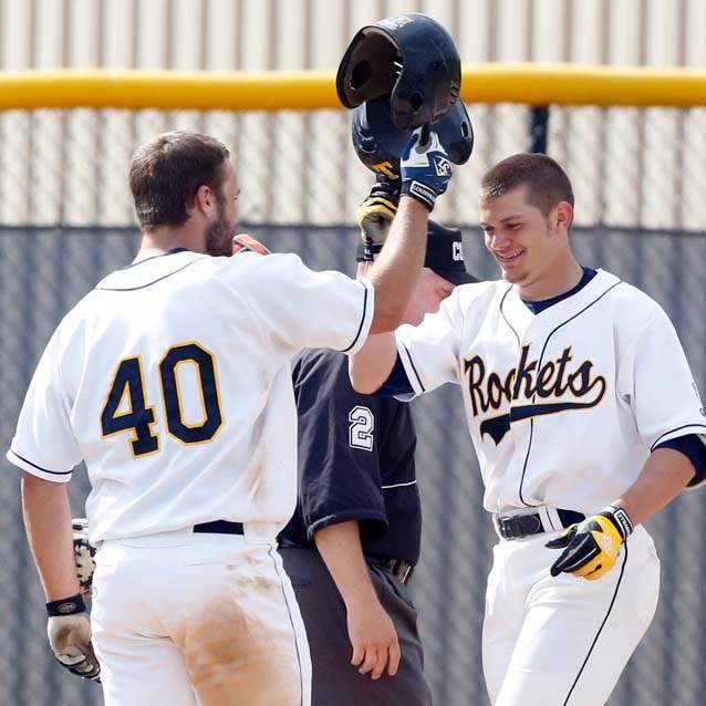 SPT-UTbaseball30-bollinger-congratulates-tipton