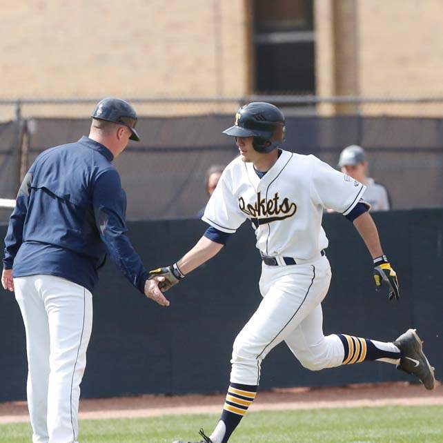 SPT-UTbaseball30-tipton-3rd-base-first-homer