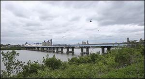 Plans for rebuilding the DiSalle Bridge include better ramps at South Avenue, where trucks to and from the riverfront terminals must make hairpin turns and rapidly change speed.