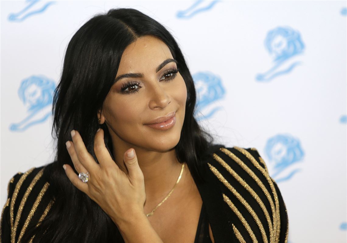 Kim Kardashian shares sexy selfie of her huge boobs next to two milk bottle  emojis - Daily Record