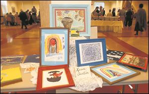 Various works of art from the Peaces of Art celebration benefiting The Padua Center.