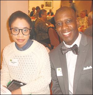 Imani Hinton, left, daughter of Norman Hinton, Padua Center board member, was one of the mistresses of ceremony, with Arto Woodley, guest speaker for the Peaces of Art celebration.