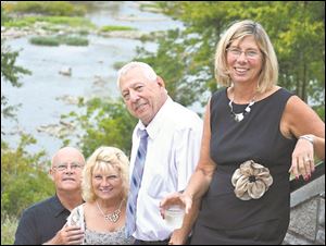 Tom and Cristi Gruppi, left, with Dave and Denise Witkowski at the Toledo Ski Club Cocktail Party.