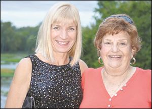 Diane Dunbar, left, and Sybil Turin at the Toledo Ski Club Cocktail Party. Sybil is 80 and still sails in the Mills Race. She is an avid sportsman.