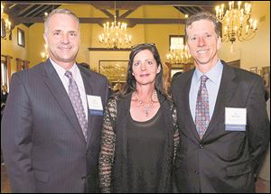 From left are Paul Devers, Elise Devers, and Joe Schrader during the 14th annual MS Dinner of Champions.