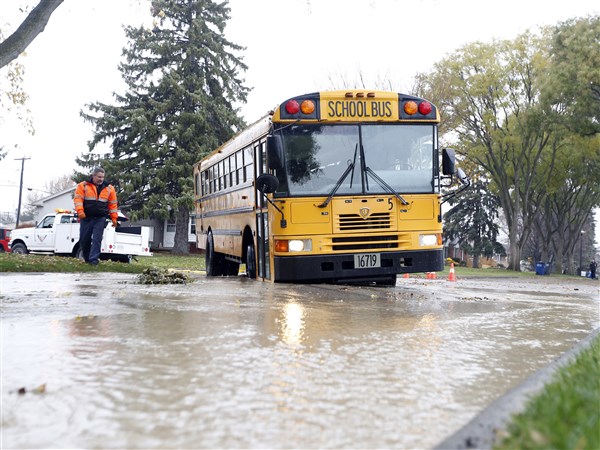 Washington Local school bus caught in sinkhole | The Blade