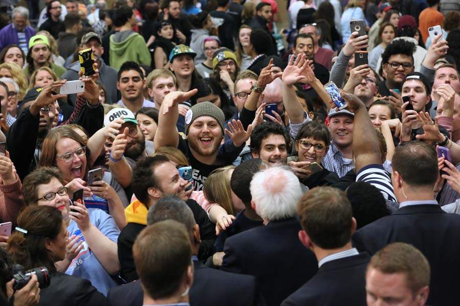 sanders12p-sanders-greets-crowd