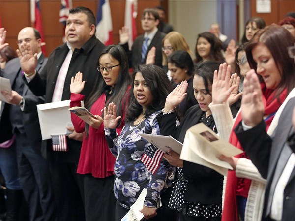 48 people sworn in as new U.S. citizens | The Blade