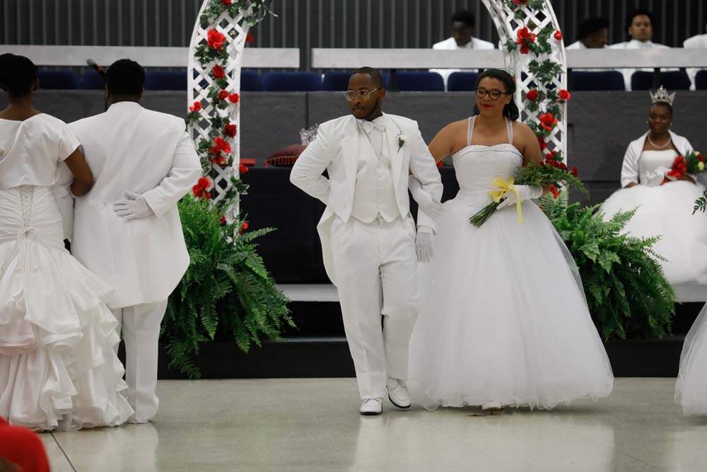 SOC-cotillion27p-Courtney-Moreland-is-escorted-by-Andre-Smith-Jr