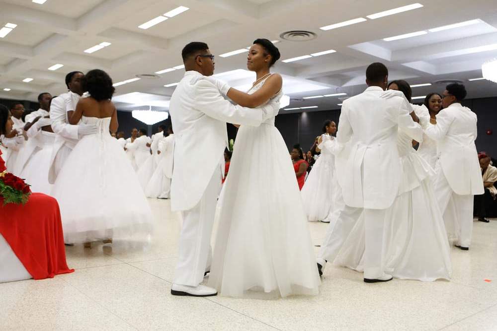 SOC-cotillion27p-Onyx-Salone-Fuller-and-her-escort-Marquez-Abercrombie-Williams