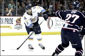 Toledo's Tyler Barnes (7) looks for an opening during the first period of a game in 2015.