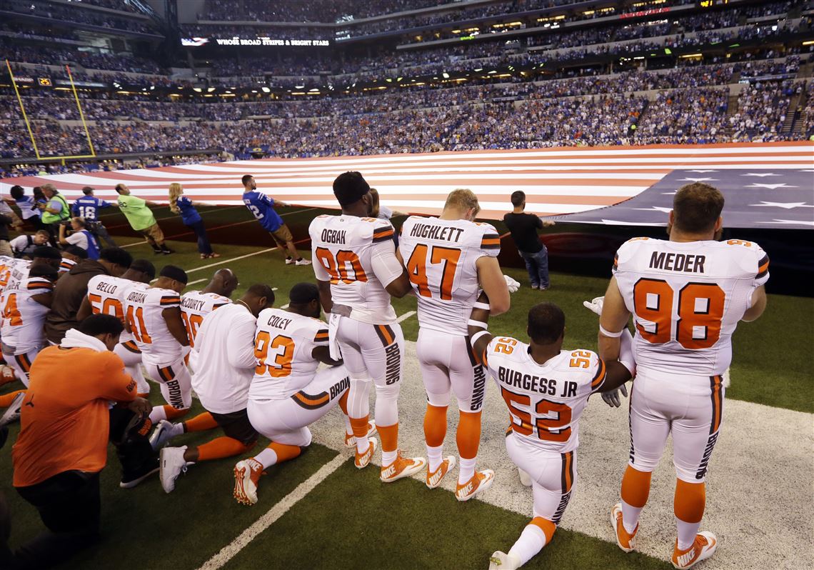 Browns players stand with police for national anthem