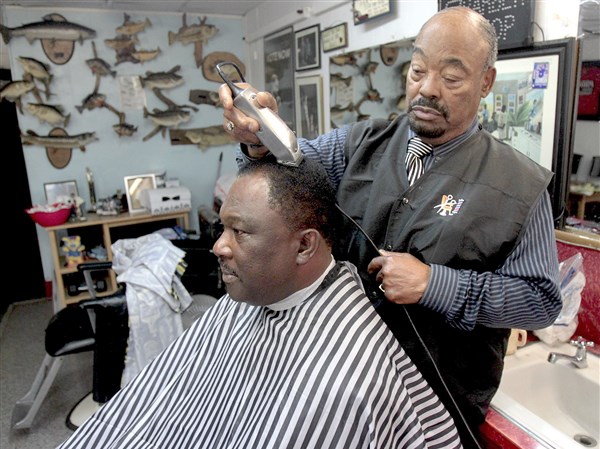 Pastor says his role as a barber complements his ministry | The Blade