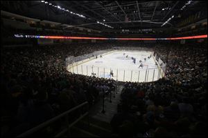 A packed arena watches the Toledo Walleye against the Quad City Mallards at the Huntington Center October 21. Scenes from an upcoming NBC TV show will be shot at Thursday morning's game between the Walleye and the Fort Wayne Komets.