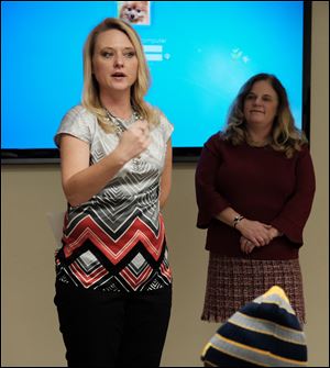 Lisa Holloway, with MOD, left, and Amy Swanson, with United Healthcare Community plan.