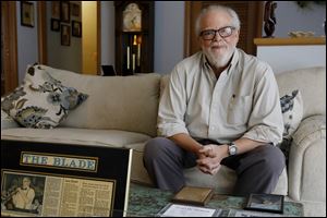 Band leader Ray Heitger keeps memorabilia from the Ray Heiger's Cakewalkin' Jass Band at his home Thursday, November 16, 2017, in Toledo.