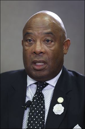 Larry Sykes speaks with Toledo Blade editorial board members during a forum with Toledo City Council candidates in October.