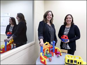 Alexia Metz, associate professor at the Unversity of Toledo, with occupational therapist and former UT graduate student Carly Dauch at UT Health and Human Services building.