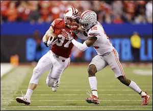 Denzel Ward, right, is a projected top-10 pick in next week's NFL draft.