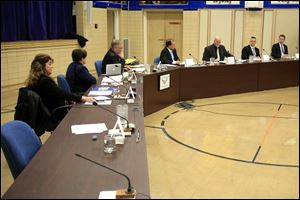 Patrick Hickey's vacant seat at the beginning of the Washington Local school board meeting at Washington Local administration building Jan. 3.