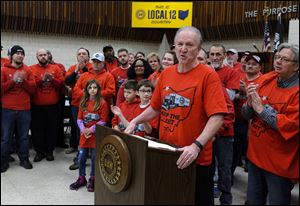 Local 12 President Bruce Baumhower speaks during a protest at UAW Local 12 against the proposed elimination of jobs at the Toledo Jeep transportation facility.