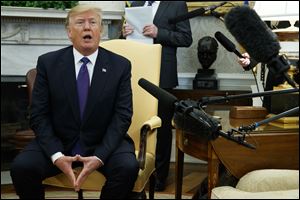 President Donald Trump speaks during a meeting with Kazakhstan's President Nursultan Nazarbayev in the Oval Office of the White House on Jan. 16 in Washington.