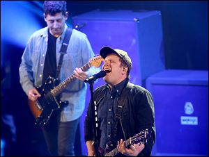 Fall Out Boy performs on stage at the iHeartRadio Album Release Party at the iHeartRadio Theater Los Angeles in Burbank, Calif.