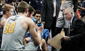 University of Toledo head coach Tod Kowalczyk gives instructions against Northern Illinois. Kowalczyk and his staff have embraced the growing trend of analytics in how they game plan and scout opponents.