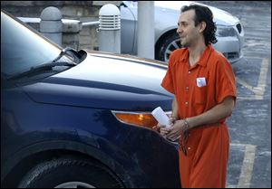 Mark Alex Simon, 34, leaves after appearing at the Federal Courthouse in Toledo on Thursday, February 8, 2018. Simon was arrested on accusations he was manufacturing phony identification cards on a large scale.