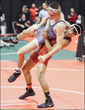 Hunter Yackee of Wauseon defeats Coleman Manning of Eaton.