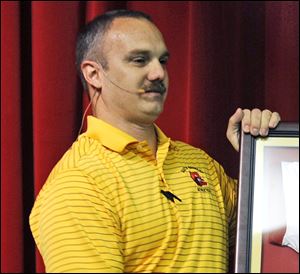 This undated photo shows Chris Hixon, athletic director at Marjory Stoneman Douglas High School in Parkland, Fla. Hixon was killed when former student Nikolas Cruz opened fire at the school on Wednesday.