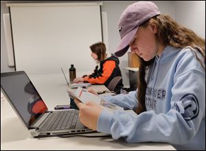 University of Findlay social work major Meghan Lascher works on her stimulants group project during an introductory class on substance abuse issues.